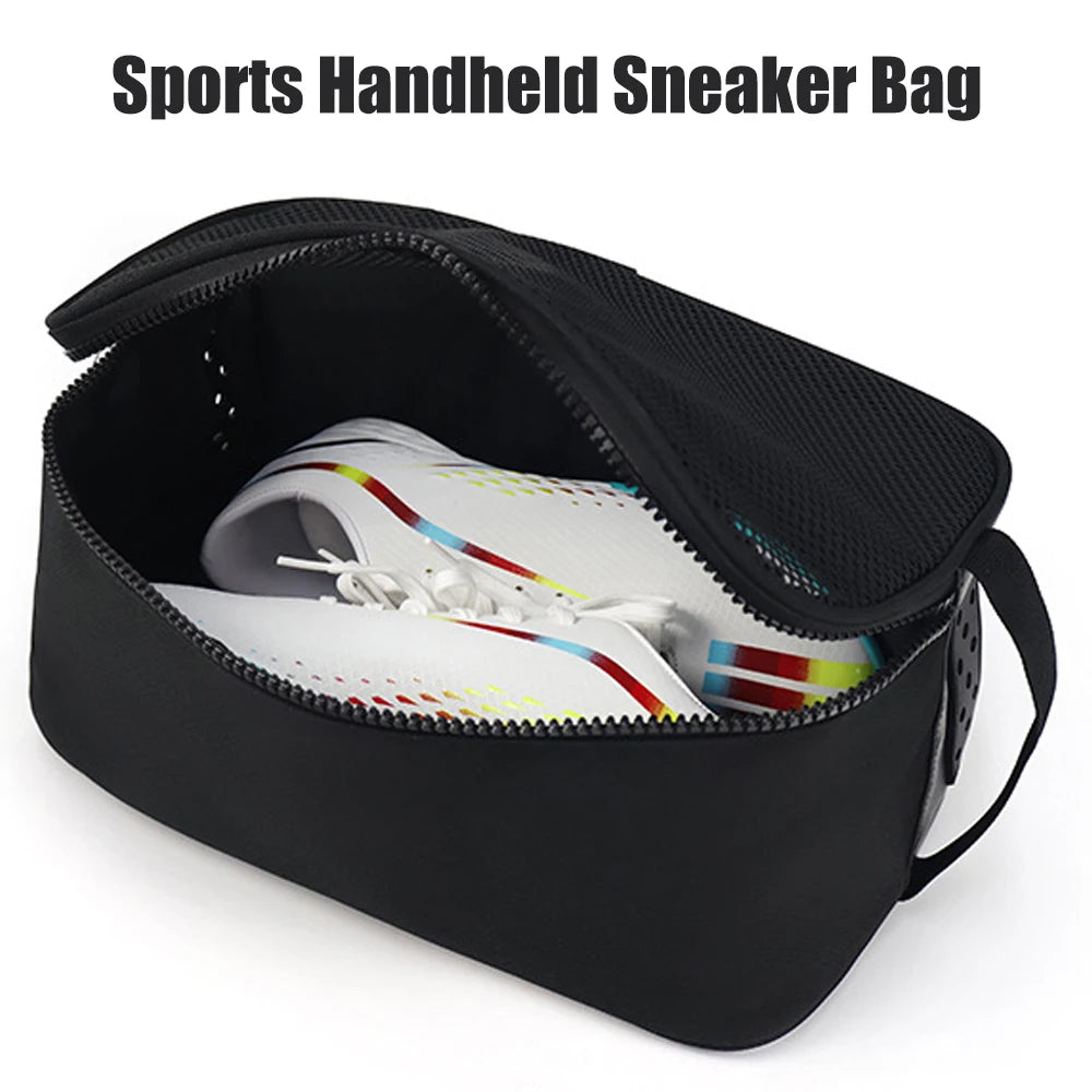 Black handheld sneaker bag with a zippered opening, holding a white and colored athletic shoe.