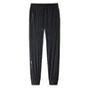 Black men's ice silk performance pants shown flat lay