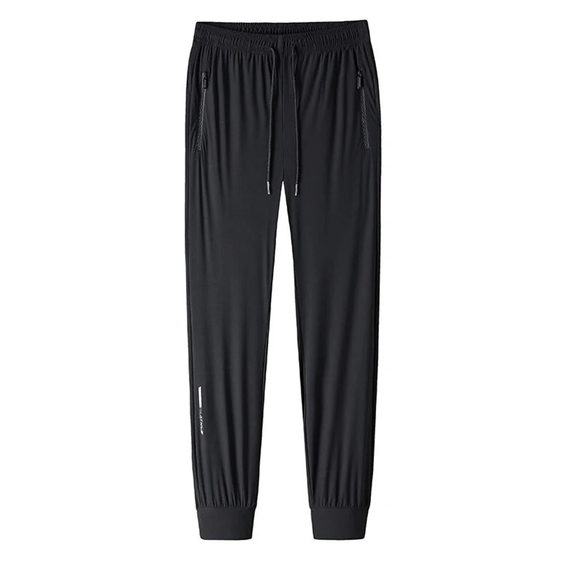 Black men's ice silk performance pants shown flat lay