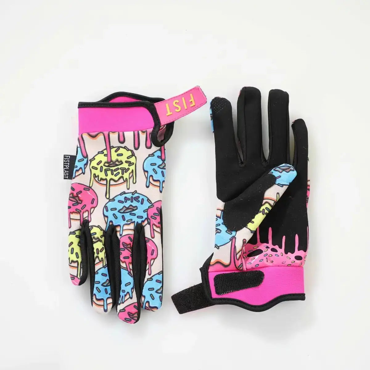 A pair of pink and black durable motorcycle and mountain bike gloves with colorful splatter designs.