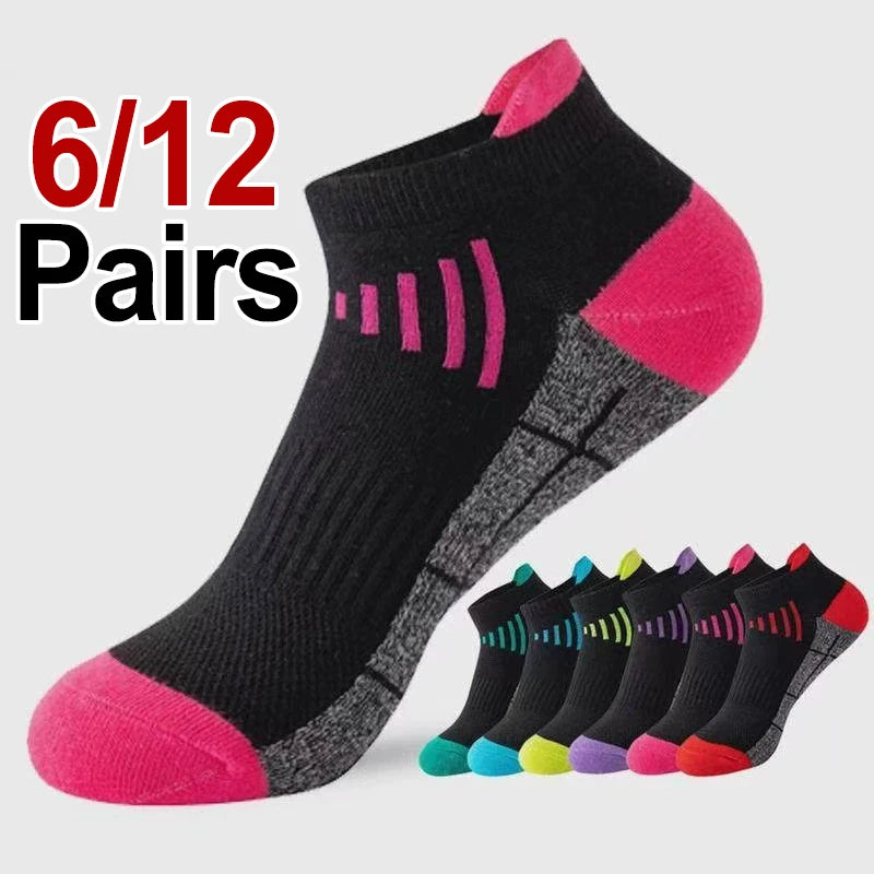 A pack of 12 pairs of black and pink knit sports socks displayed next to a red number tag.