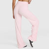 Light pink high-waist yoga pants shown on a model's legs.