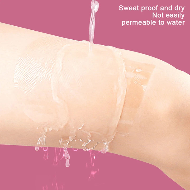 A close-up of a transparent body shaping patch being squeezed with water on human skin.