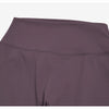 A close-up view of a solid purple women's high-waist flared yoga pant.