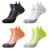 Mehrfachpack compressionsportsocken für Herren und Damen in Schwarz, Weiß, Orange und Limettengrün