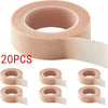 A roll of pink eyelash extension tape with 20 pieces shown in various angles.