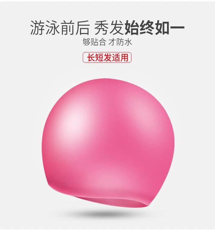 A pink silicone swimming cap shown in a close-up, round shape.