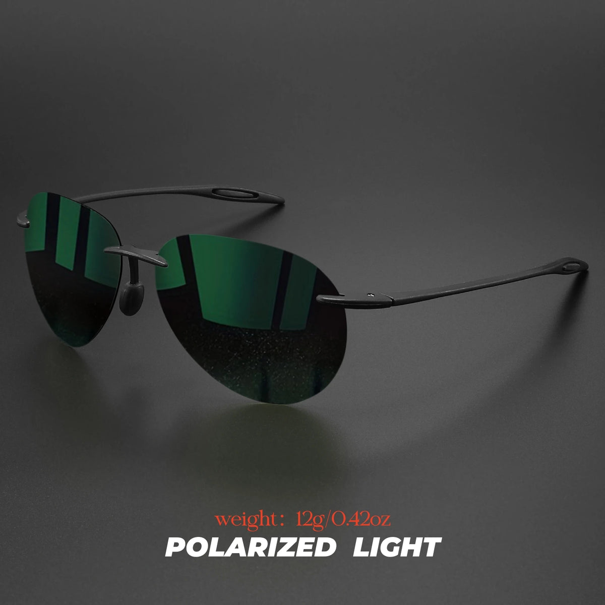 A pair of dark green polarized light aviator sunglasses resting on a dark surface.