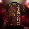 A dark maroon soccer jersey featuring a gold eagle design and the word MEXICO in gold text.