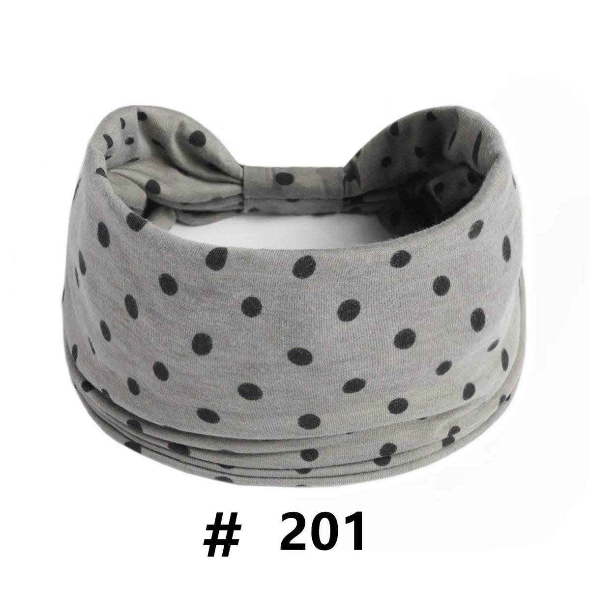 Gray knitted headband with black polka dots for yoga or workout