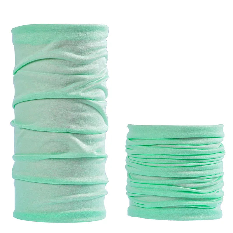 Light mint green seamless fabric headbands and balaclavas rolled up