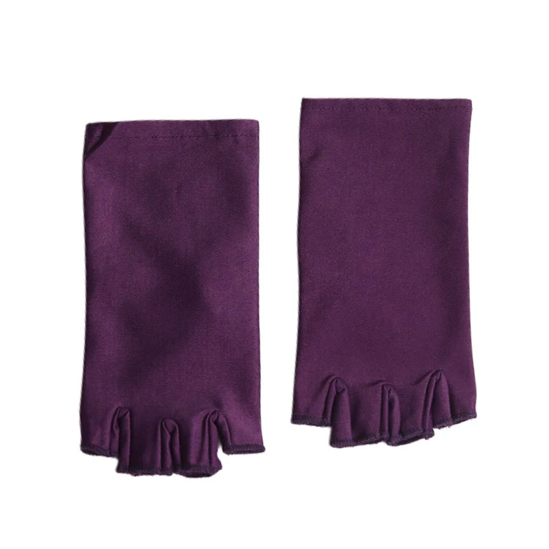 A pair of deep purple women's thin stretch elastane gloves for driving and cycling.