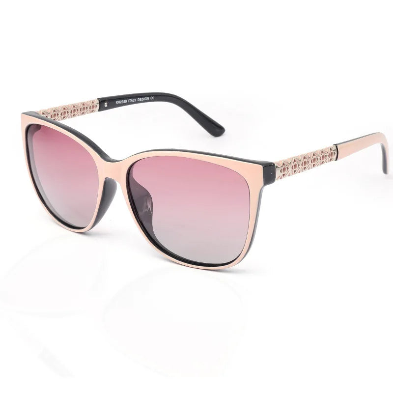Pink-tinted cat eye polarized sunglasses with a gold patterned frame