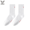 A pair of white crew socks with red trim for athletic activities