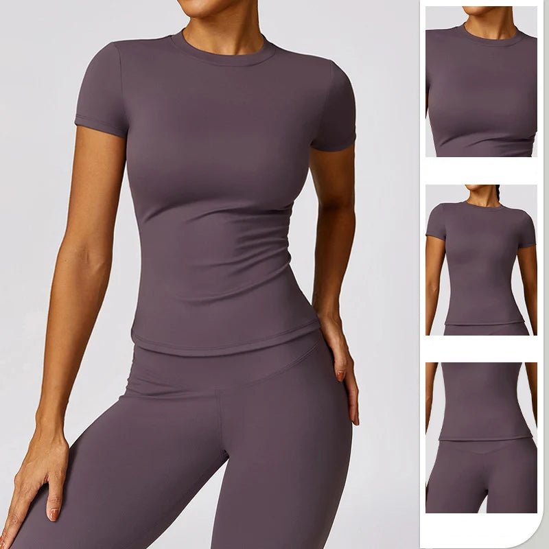 A model wearing a mauve women's breathable yoga and fitness t-shirt and matching leggings.