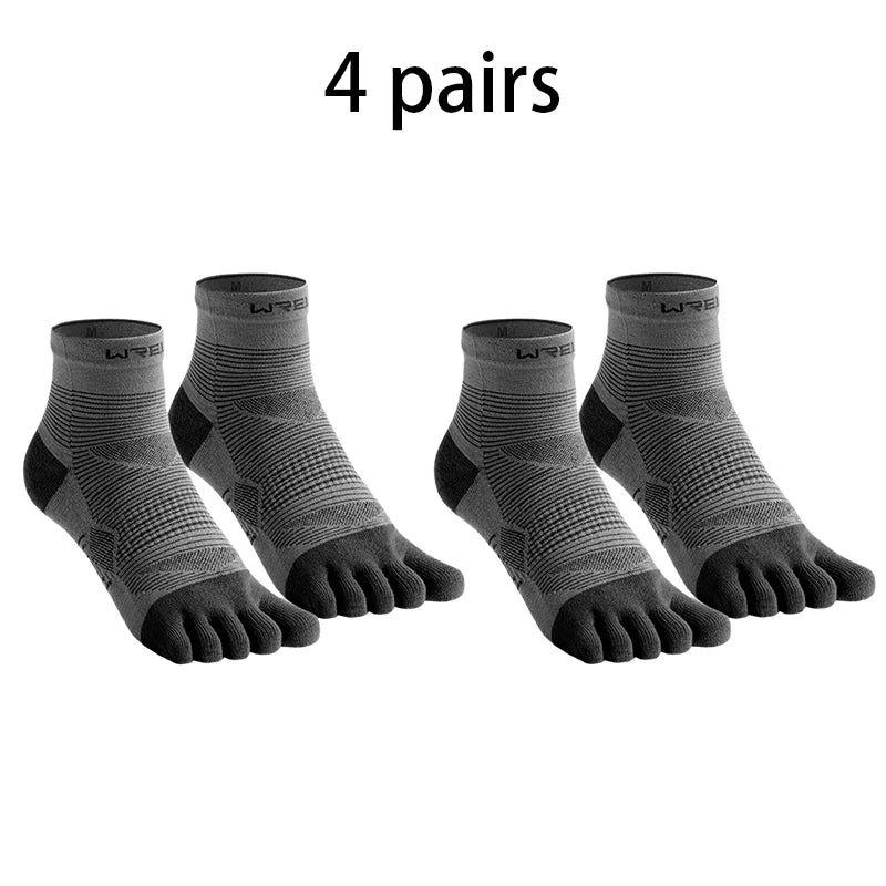 Four pairs of black high-performance five-finger compression socks laid out.