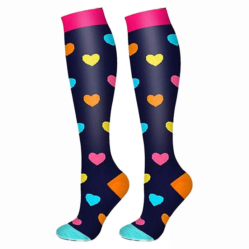 A pair of black compression elastic socks decorated with colorful hearts and stripes.