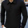 A black men's breathable casual polo shirt with a collar and button placket, shown on a model.