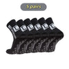 Five pairs of black mid-calf football socks with white lettering and a patterned design.