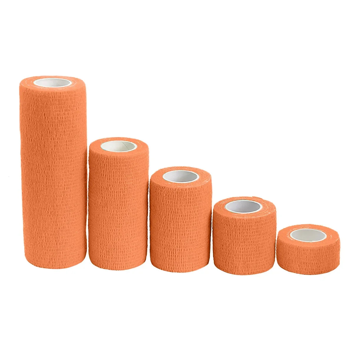 Several rolls of orange elastic tattoo grip tape for finger and wrist protection