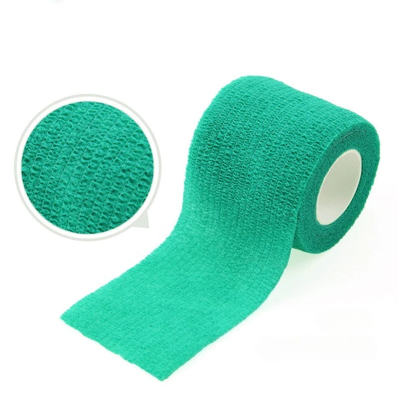 A roll of teal green self-adhesive elastic bandage tape with a circular swatch shown separately.