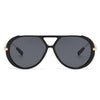 Vintage oversized designer black sunglasses with gold accents