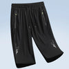 Black men's quick dry jogging shorts with zippered pockets and a subtle logo detail.