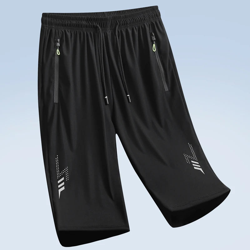 Black men's quick dry jogging shorts with zippered pockets and a subtle logo detail.