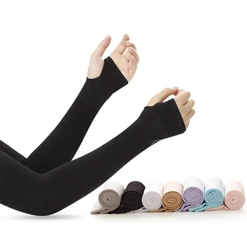 A pair of black ice sleeves for sports and outdoor activities are shown, with several rolled-up sleeves nearby.