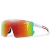 A pair of orange-tinted cycling sunglasses with white and pink accents resting on a white background.
