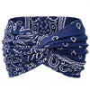 Navy blue boho leopard print yoga headband tied in a knot