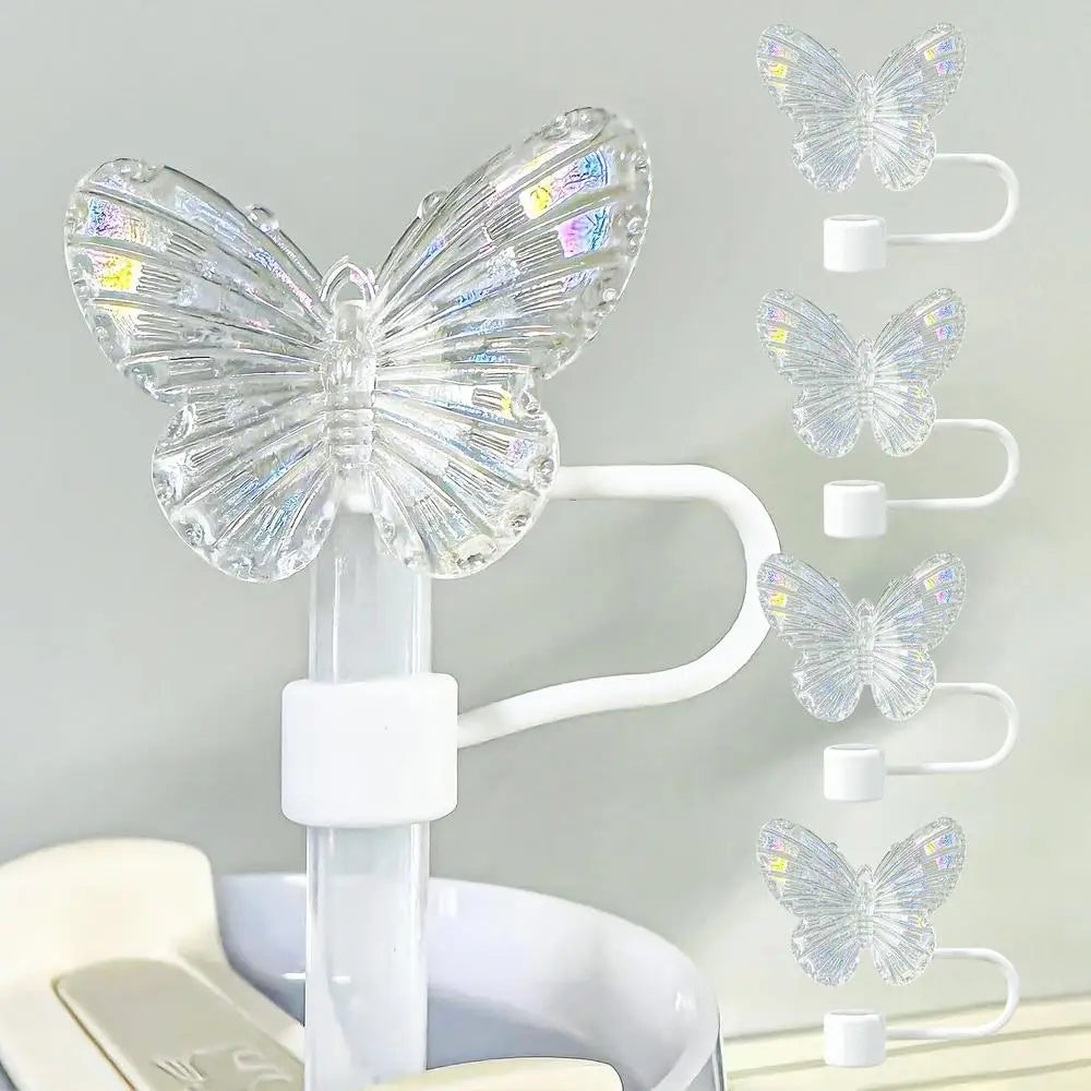 A clear silicone butterfly straw cover is shown with multiple butterfly shapes, including a large one, mounted on a white hol
