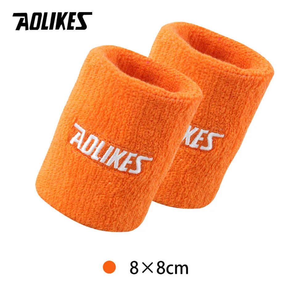 Orange silicone wristbands for sport and activewear, measuring 8x8cm.