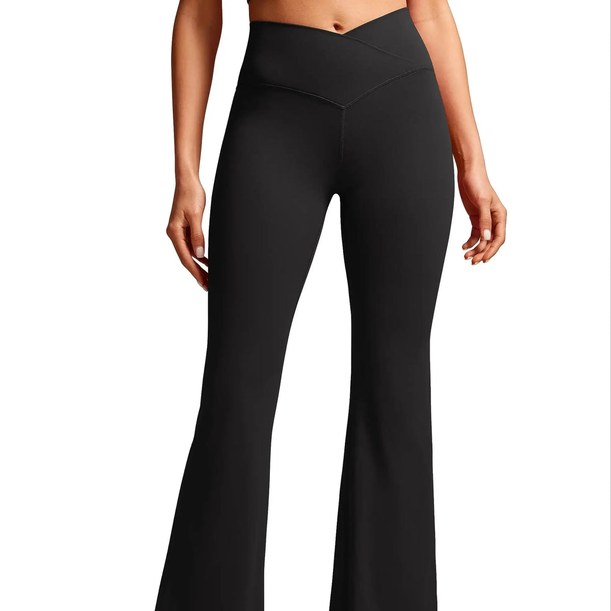 Black high-waist crossover flare leggings worn by a model.