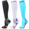 Three pairs of medical grade compression socks in black white and light blue colors