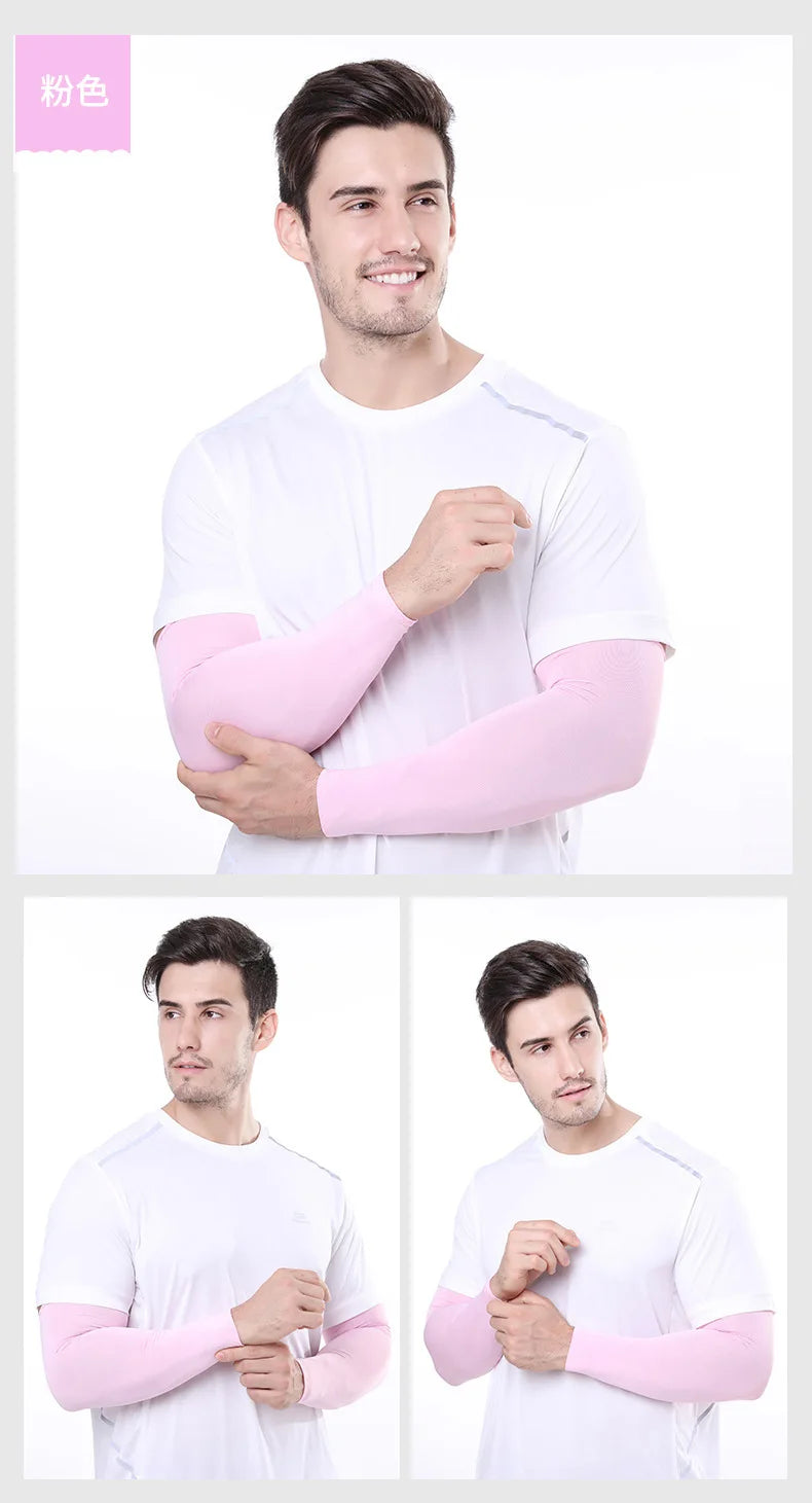 A man wearing white clothing demonstrates the pink cooling arm sleeves for UV protection.