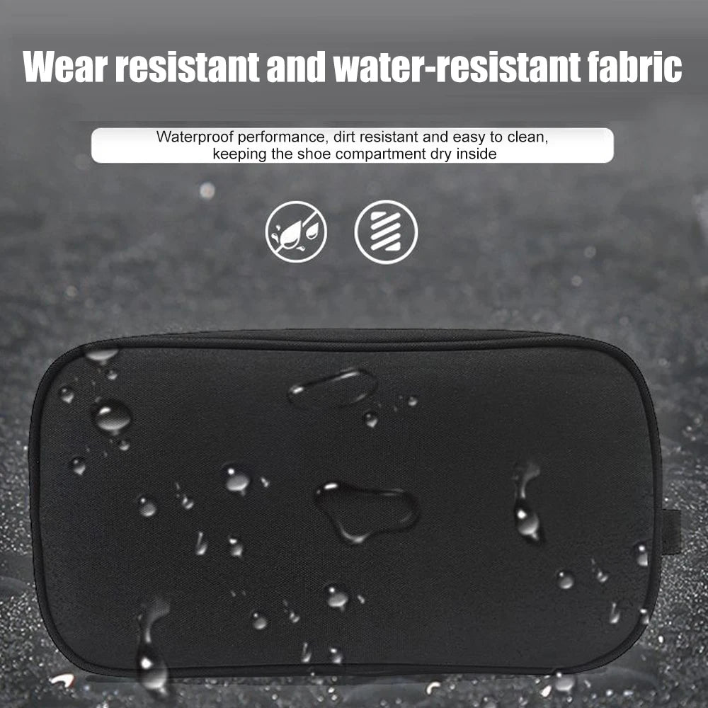 Black waterproof sports shoe carrier bag with water droplets on the surface