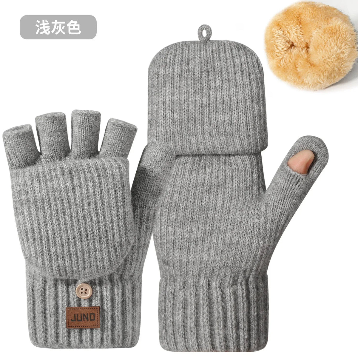 Gray knit gloves with a fluffy tan pom-pom and a brown tag