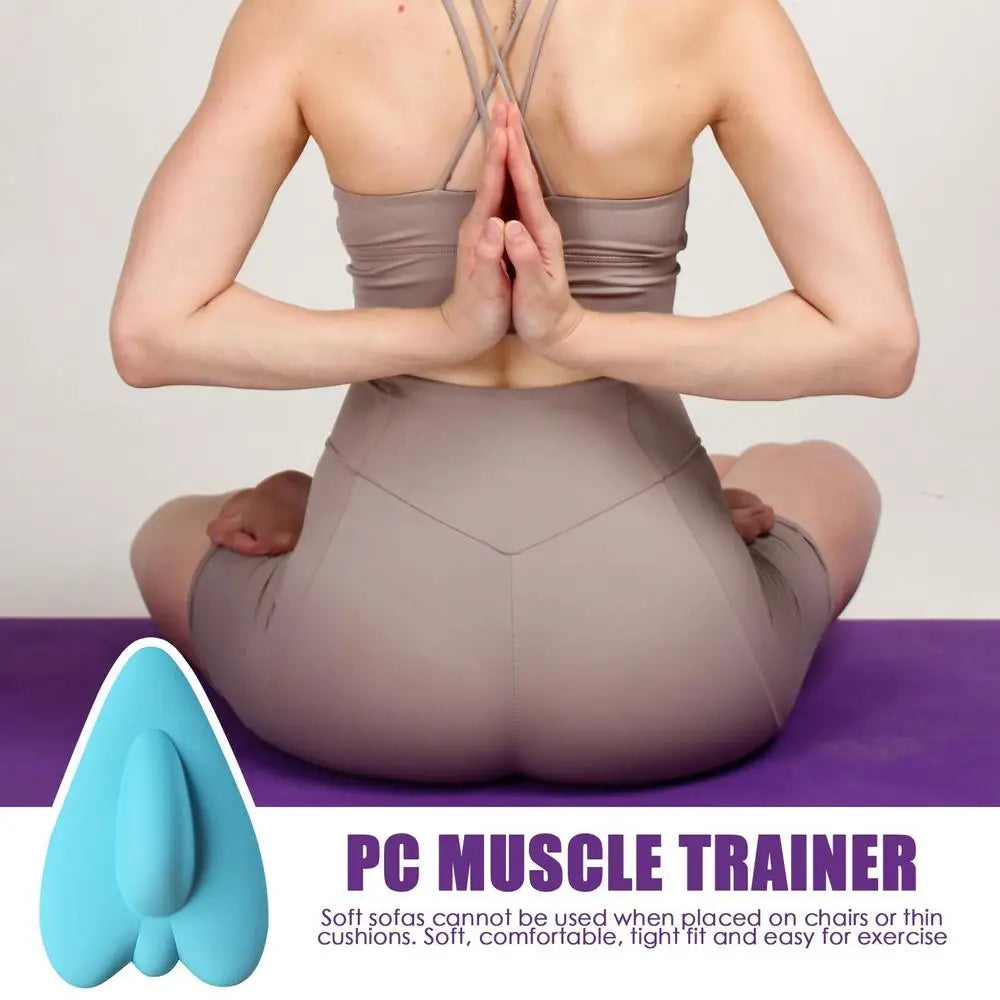 A person is demonstrating the use of a PC muscle trainer for pelvic floor exercise.