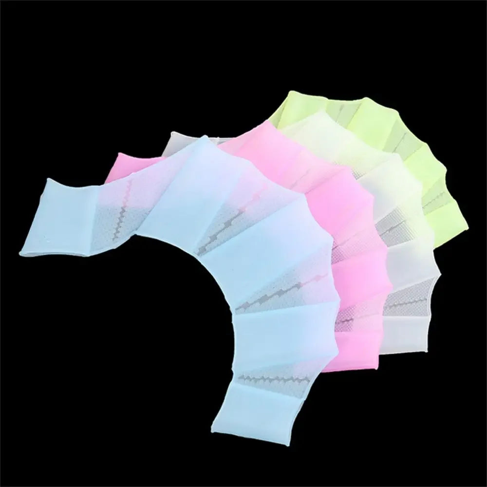 A set of silicone swim training flippers in pastel colors, including pink, light blue, and yellow-green.