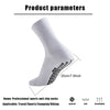 White athletic grip socks shown from the side, highlighting their design and thickness.