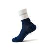 A navy blue performance athletic running sock with a white cuff and gray stripe.