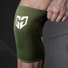 Olive green compression knee sleeve with a white geometric logo on a person's leg.