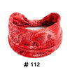 Red paisley print cotton fabric tied into a headband