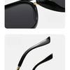 A pair of black fashion protective sunglasses shown in two views.