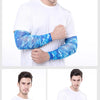 A man models blue and white patterned cooling arm sleeves on his forearm.