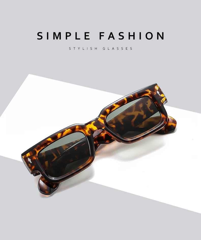 Brown leopard print sunglasses with tortoiseshell frames shown on a white background.