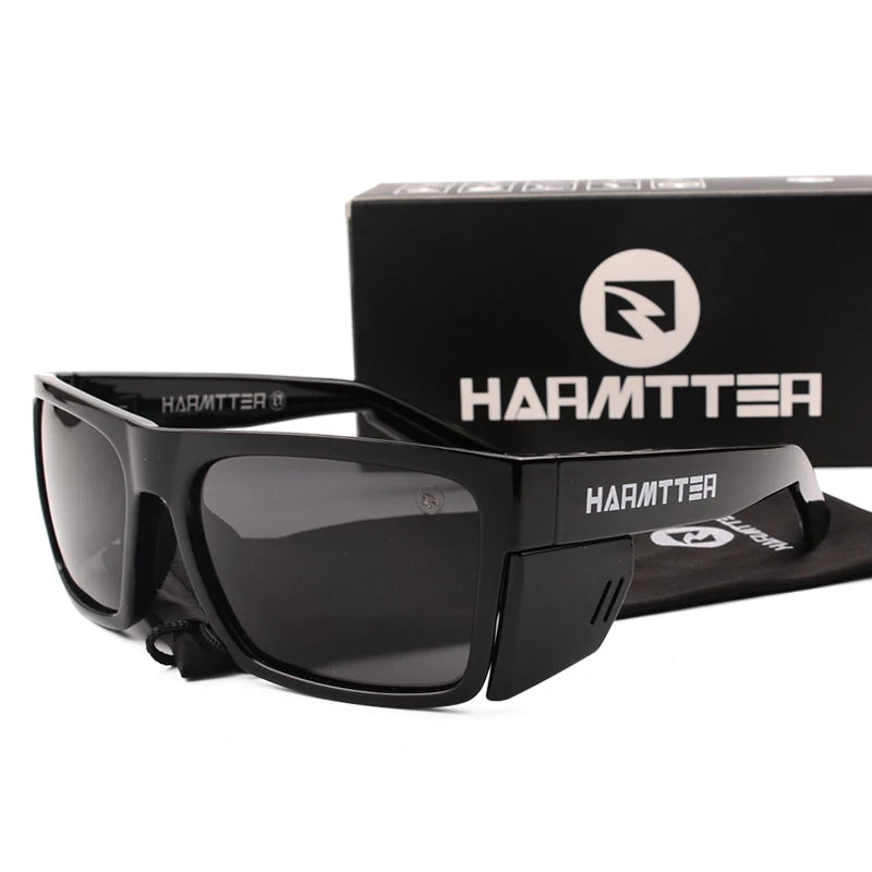 Black Harmtter polarized sports sunglasses with UV400 protection displayed next to its box.