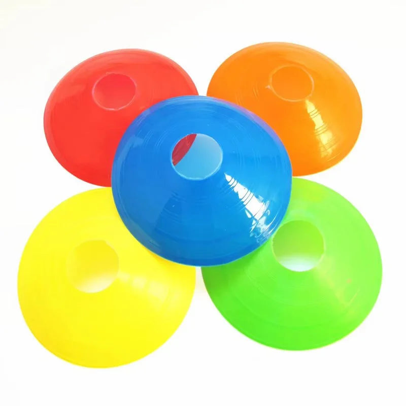 A set of five brightly colored soccer training discs in red, orange, blue, yellow, and green.