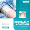 A hand applies white medical tape to a person's skin for adhesion, demonstrating the use of OKTAPE acrylic glue.